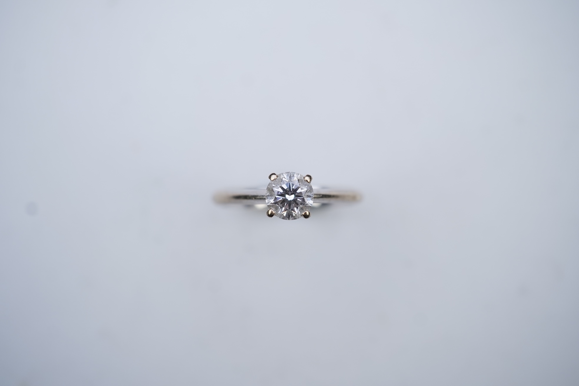 A diamond solitaire ring